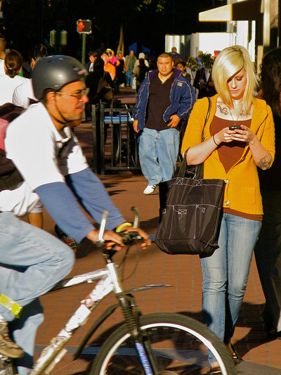 Woman on a city sidewalk